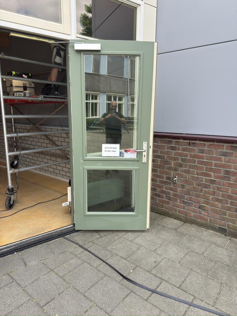 Groene buitendeur na Re-Style